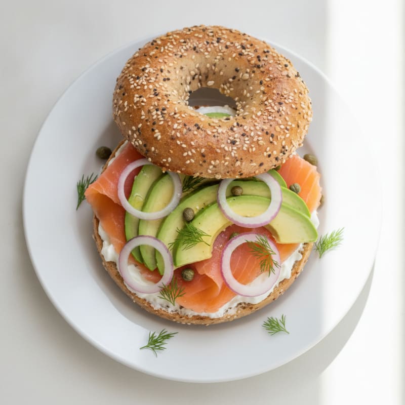 Smoked Salmon Bagel with Avocado and Onion