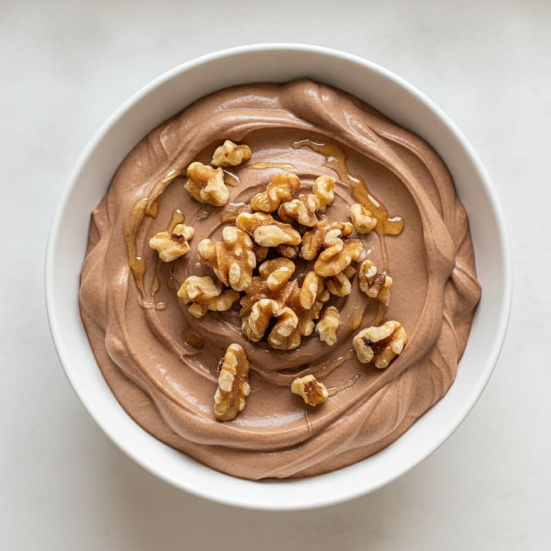 Chocolate Protein Greek Yogurt with Chopped Walnuts