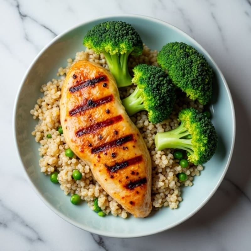 Grilled Chicken Breast with Steamed Broccoli and Quinoa