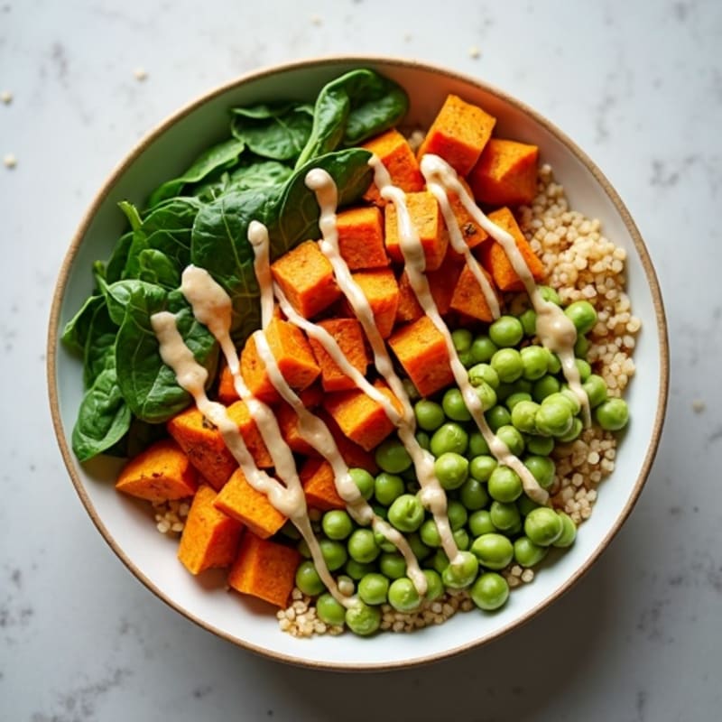 Crispy Roasted Chickpea and Sweet Potato Grain Bowl with Creamy Lemon Tahini