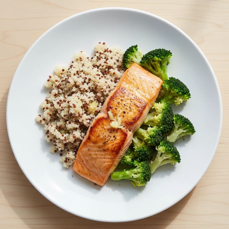 Seared Salmon Fillet with Steamed Broccoli and Quinoa