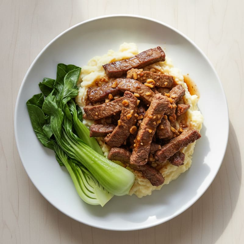 Seared Lean Beef Strips with Steamed Pak Choy and Cauliflower Mash