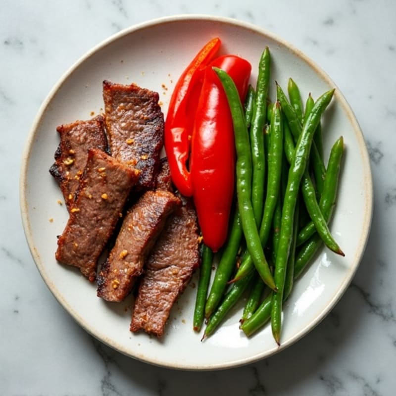 Lean Steak Strips with Roasted Green Beans and Bell Peppers