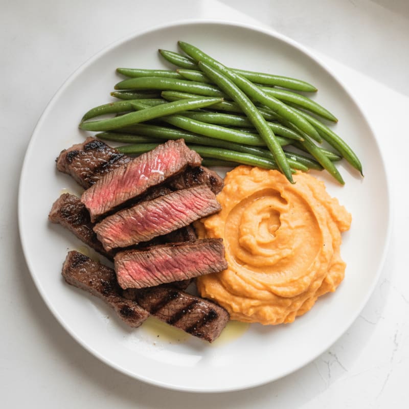 Seared Beef Strips with Steamed Green Beans and Sweet Potato Mash