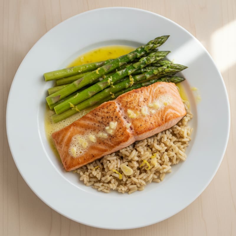 Seared Salmon Fillet with Steamed Asparagus and Lemon-Garlic Brown Rice