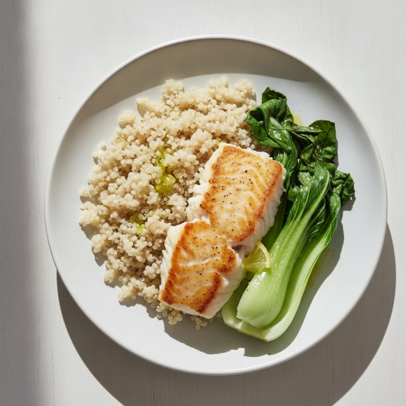 Seared White Fish with Steamed Greens and Quinoa