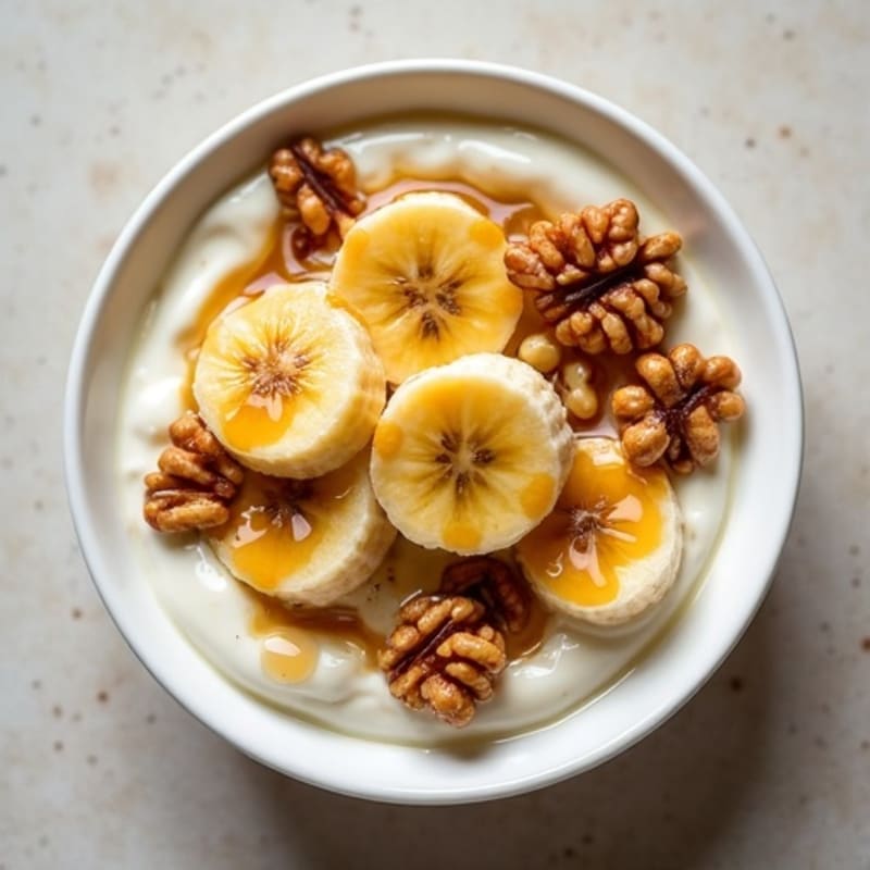 Creamy Greek Yogurt with Warm Caramelized Bananas and Crunchy Walnuts