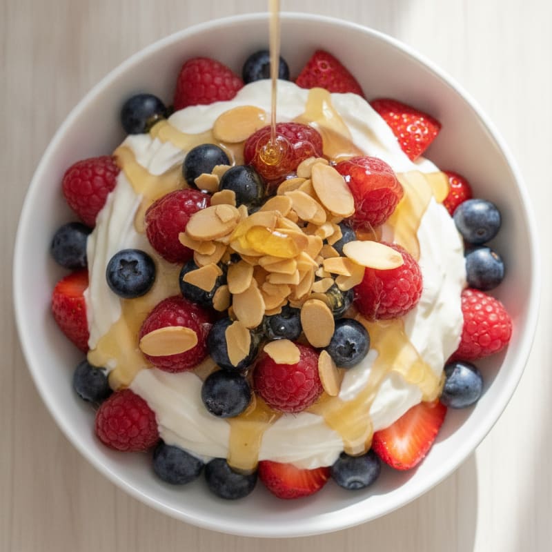 Greek Yogurt Parfait with Mixed Berries and Sliced Almonds