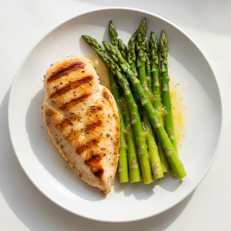 Grilled Lemon Herb Chicken Breast with Steamed Asparagus
