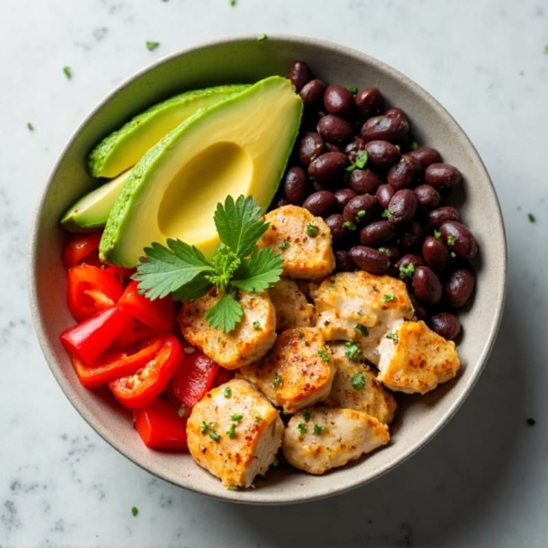 Zesty Chicken and Black Bean Bowl with Creamy Avocado