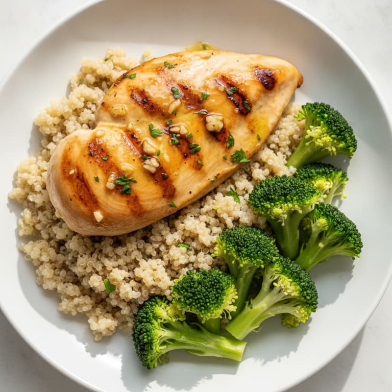 Grilled Lemon Garlic Chicken Breast with Quinoa and Steamed Broccoli