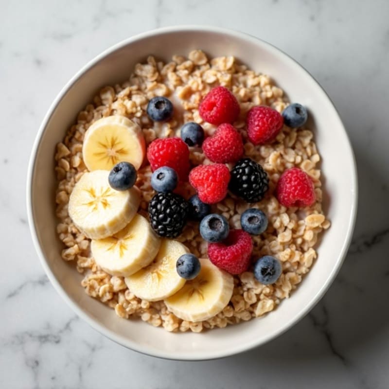 Power-Packed Banana Oatmeal with Almond Butter and Berries