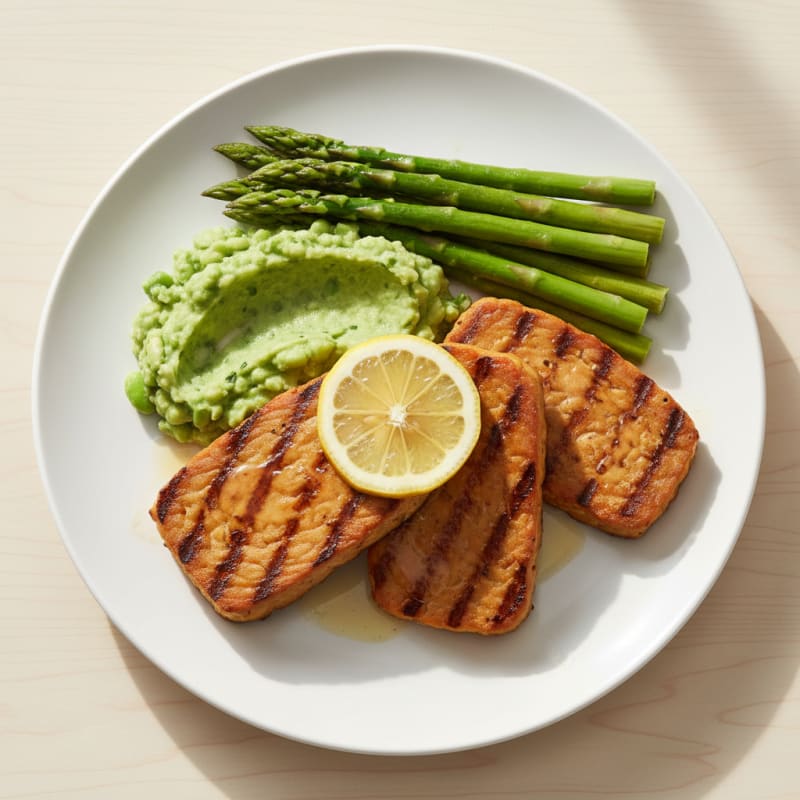 Grilled Tempeh Steaks with Steamed Asparagus and Edamame Mash