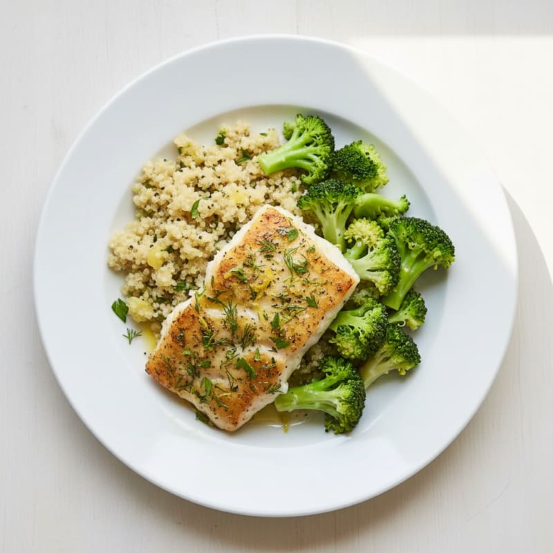 Herb-Baked Cod with Steamed Broccoli and Lemon Quinoa