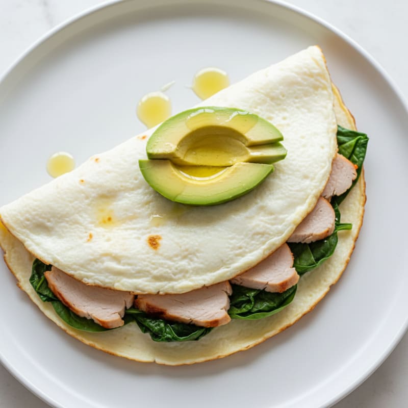 Egg White Omelette with Turkey Breast and Sautéed Spinach