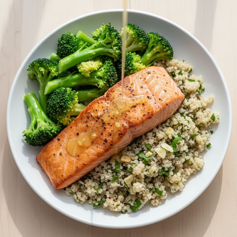 Seared Salmon Fillet with Steamed Broccoli and Garlic Quinoa