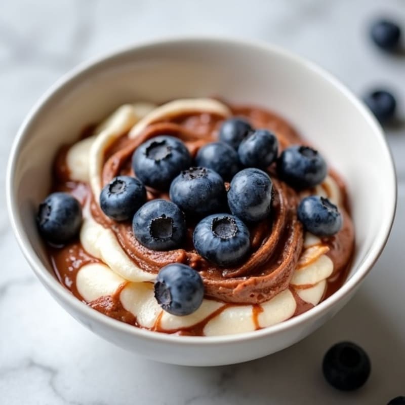 Creamy Chocolate Protein Cheesecake Swirl Bowl
