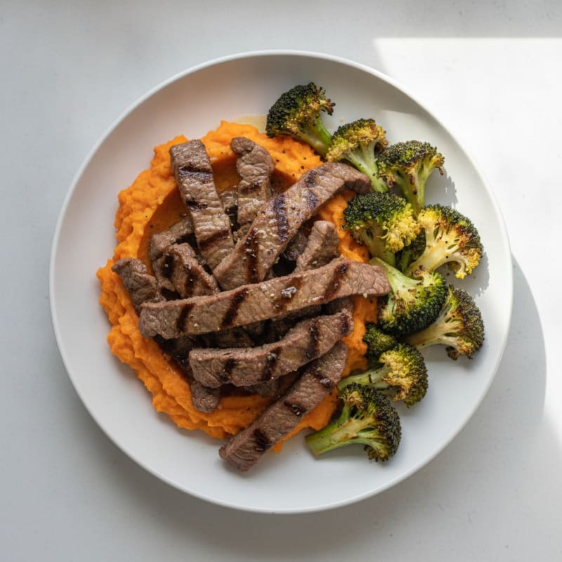 Seared Lean Beef Strips with Roasted Broccoli and Sweet Potato Mash