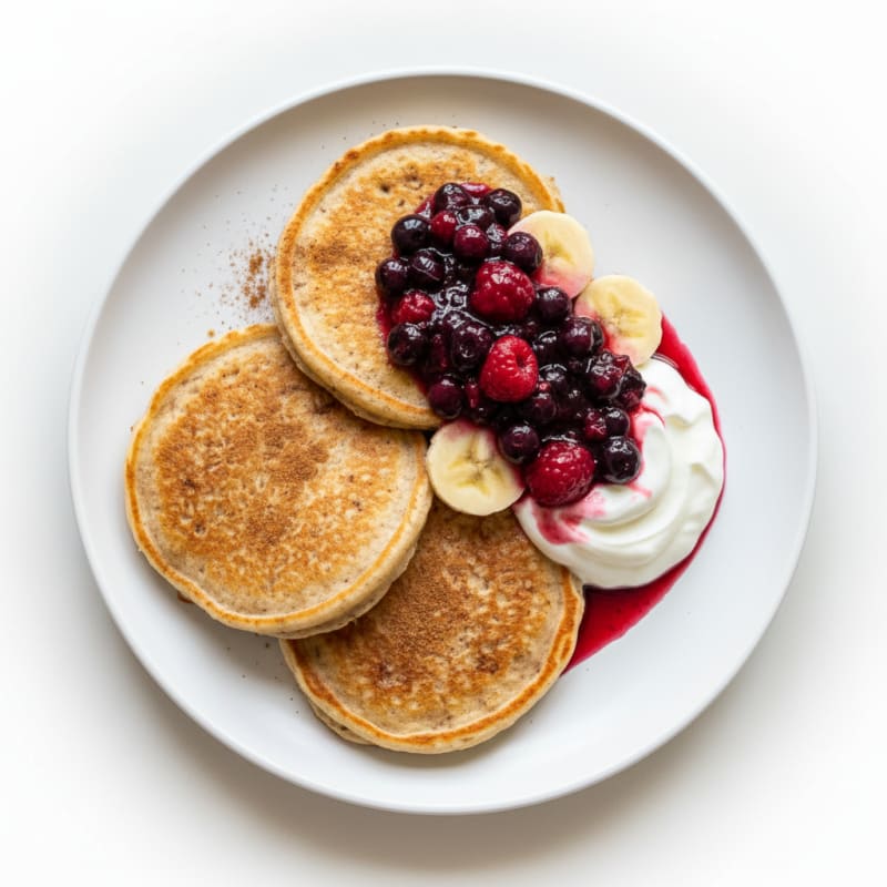 Fluffy Banana-Oat Pancakes with Berries