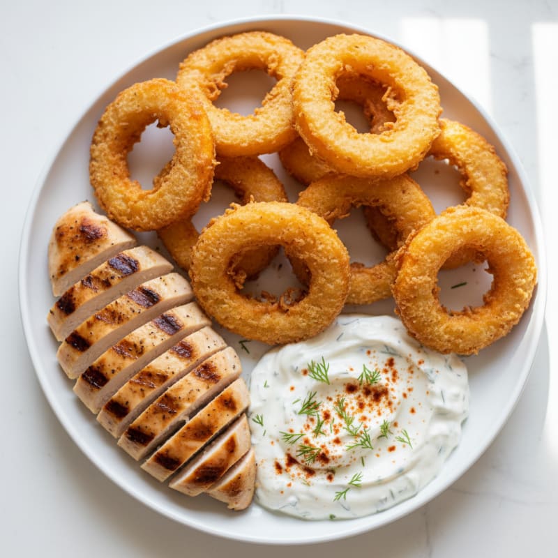Protein-Packed Beer-Battered Onion Rings with Zesty Greek Yogurt Dip