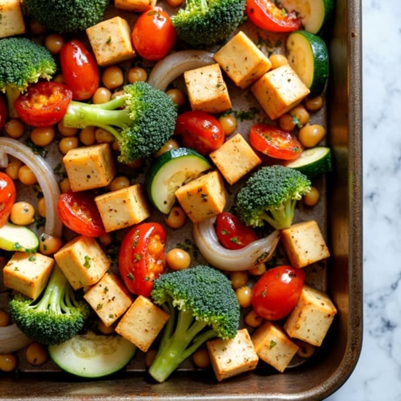 Sheet Pan Roasted Vegetables with Crispy Chickpeas, Tofu & Lemon-Herb Tahini