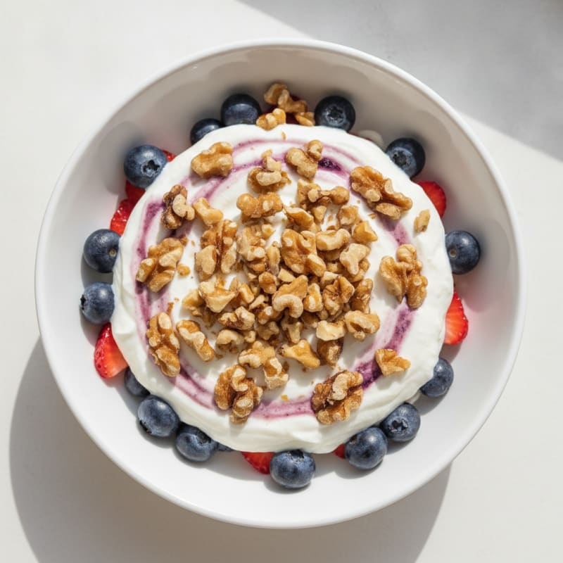 Protein Berry Yogurt Parfait with Chopped Walnuts