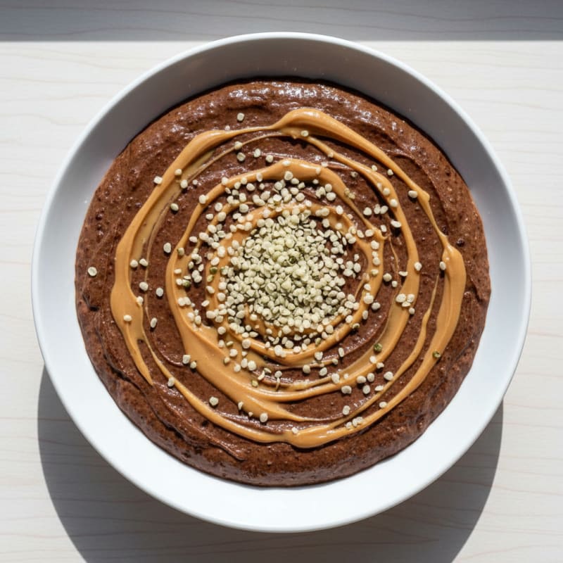 Chocolate Protein Pudding with Peanut Butter Swirl and Hemp Seeds