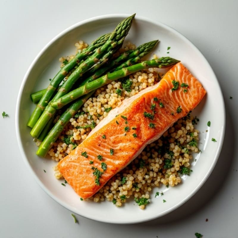 Crispy Pan-Seared Salmon with Zesty Herb Quinoa and Roasted Asparagus