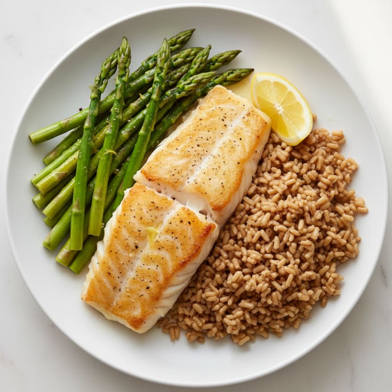 Baked Cod with Lemon Pepper Asparagus and Brown Rice