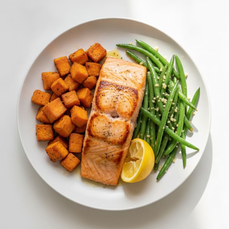 Seared Salmon Fillet with Roasted Sweet Potato and Garlic Green Beans