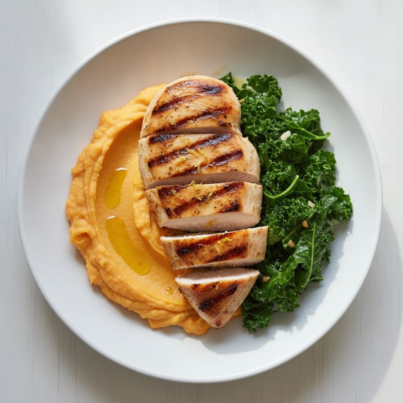 Grilled Chicken Breast with Sweet Potato Mash and Sautéed Greens