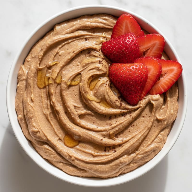 Chocolate Protein Mousse with Almond Butter Swirl and Fresh Strawberries