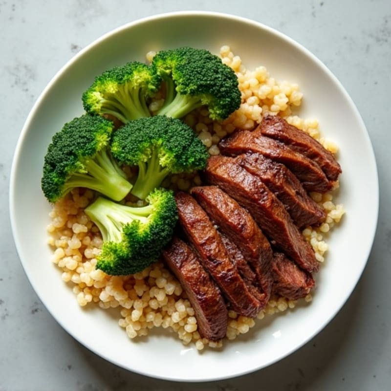 Seared Beef Strips with Steamed Broccoli and Quinoa