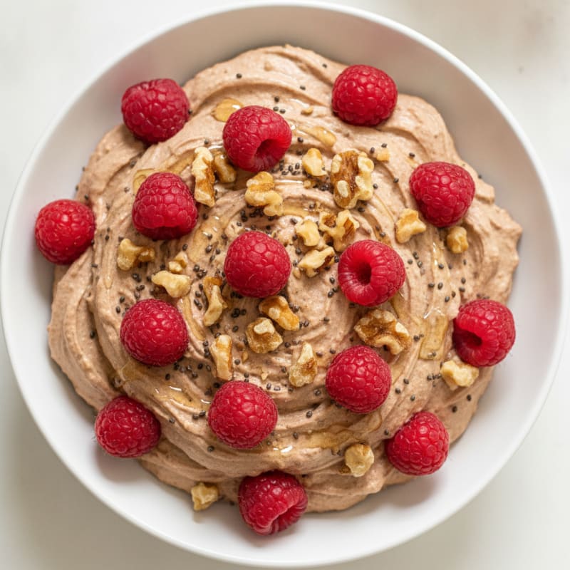 Greek Yogurt Protein Mousse with Cocoa and Raspberries