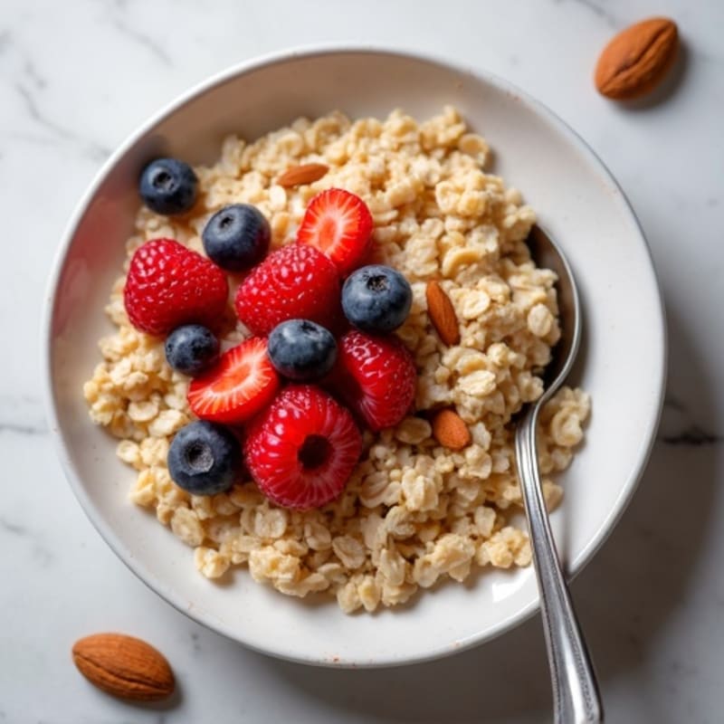 Protein-Rich Baked Honey Oats with Fresh Berries and Crunchy Almonds