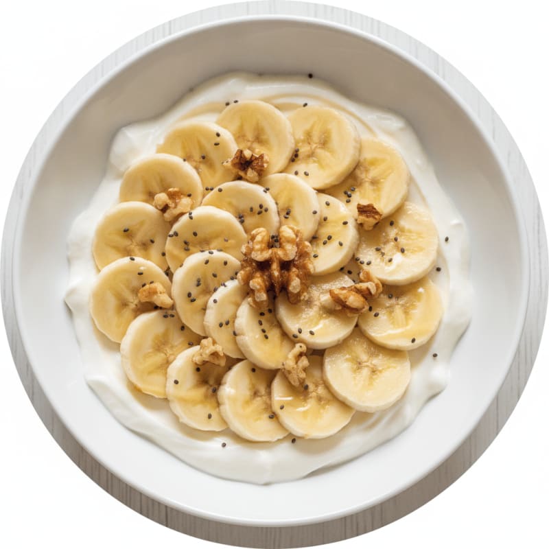 Creamy Protein Yoghurt Bowl with Sliced Bananas and Walnuts