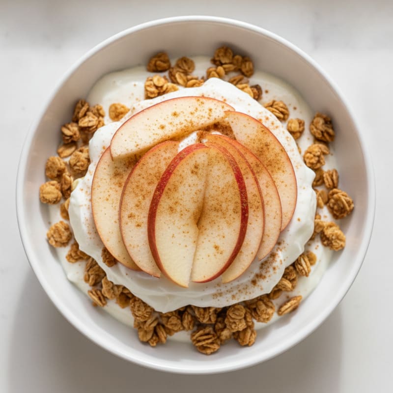Vanilla Greek Yogurt Parfait with Purely Elizabeth Granola and Sliced Apples