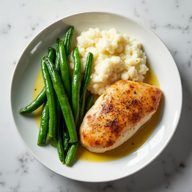 Seared Chicken Breast with Steamed Green Beans and Garlic Mashed Cauliflower