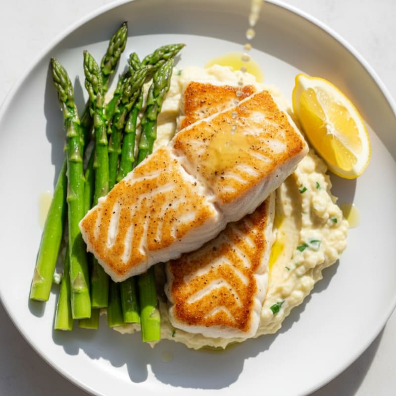 Seared Cod with Steamed Asparagus and Garlic Cauliflower Mash