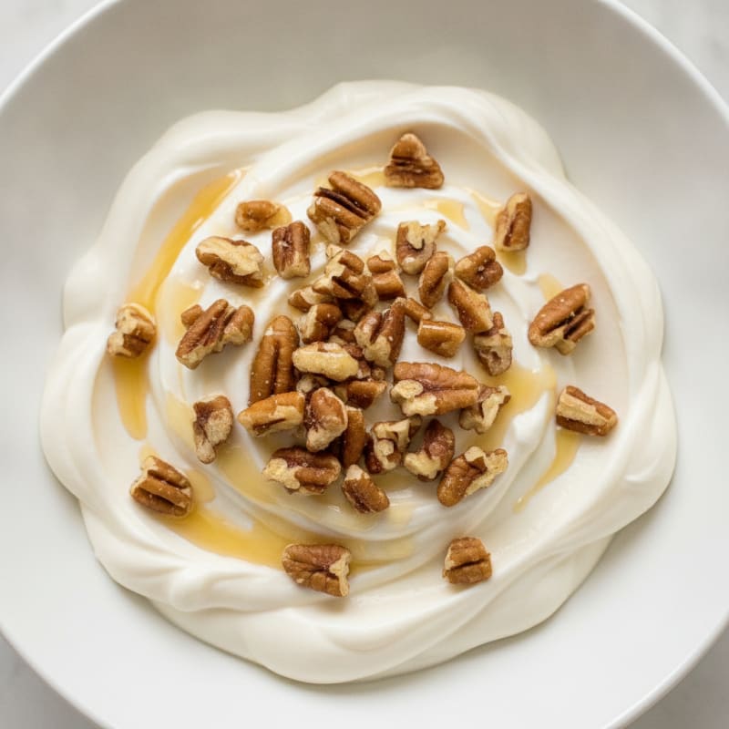 Creamy Vanilla Protein Yogurt with Chopped Pecans