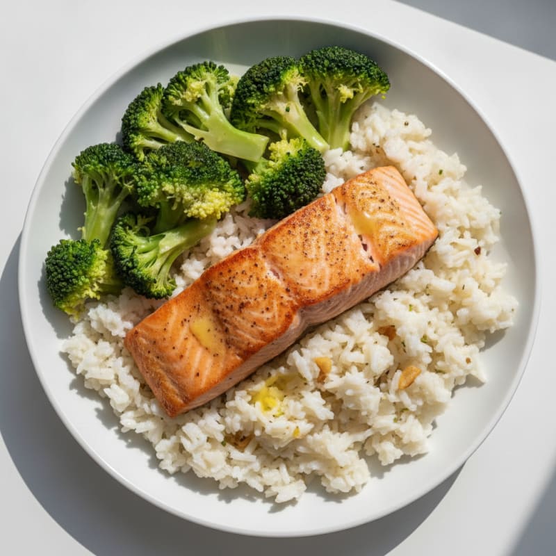 Seared Salmon with Steamed Broccoli and Garlic Rice