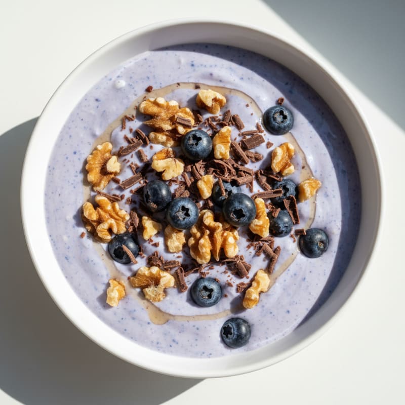 Protein Shake with Greek Yogurt, Blueberries, Dark Chocolate and Nuts