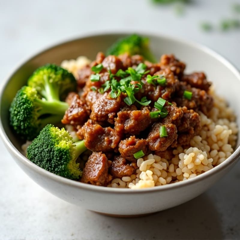 Savory Garlic-Ginger Beef and Crispy Broccoli Brown Rice Bowl