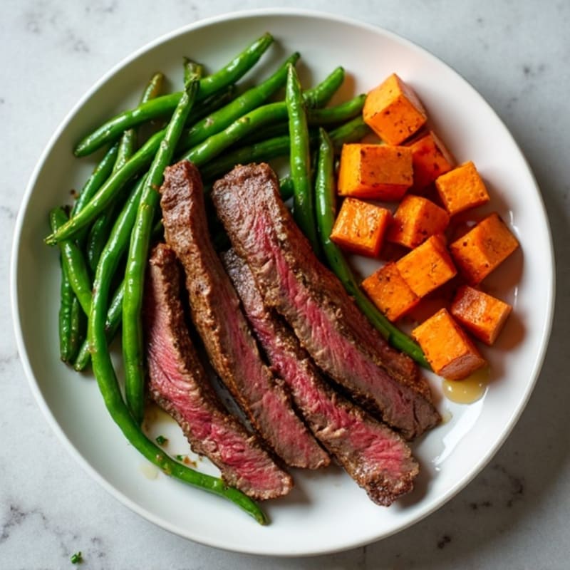 Seared Beef Strips with Garlic Green Beans and Roasted Sweet Potato