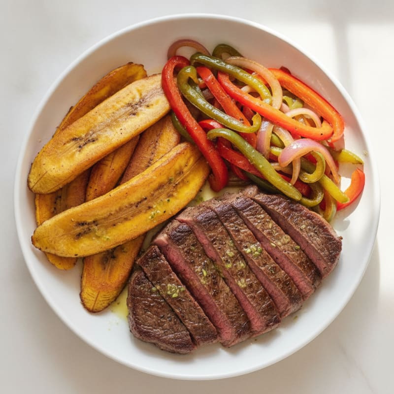 Seared Lean Beef with Roasted Sweet Plantains and Sautéed Peppers