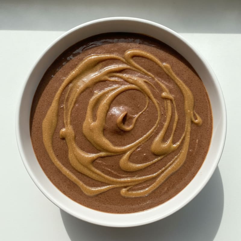 Silky Chocolate Protein Pudding with Almond Butter Swirl