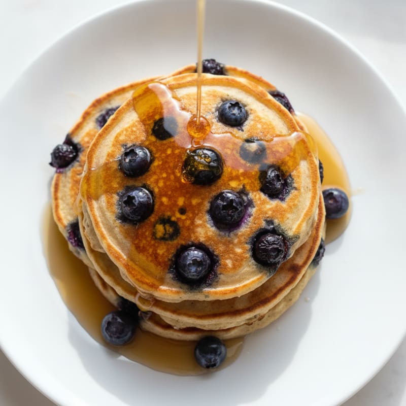 Blueberry Ricotta Pancakes with Maple Syrup