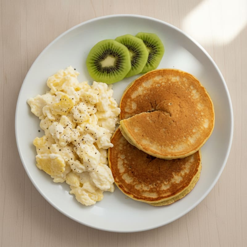 Scrambled Eggs with Sliced Kiwi and Protein Pancake