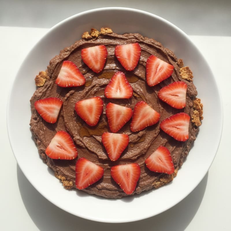 Chocolate Protein Pudding with Sliced Strawberries