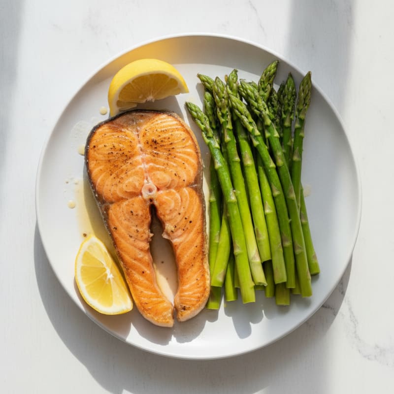 Seared Salmon Fillet with Steamed Asparagus and Lemon